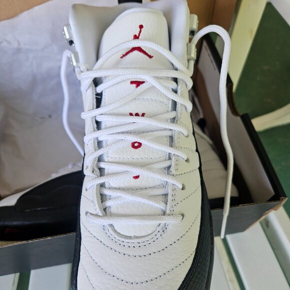 Nike Air Jordan 12 Retro  Nike Air Jordan 12 Retro in white, 5.5Y with box